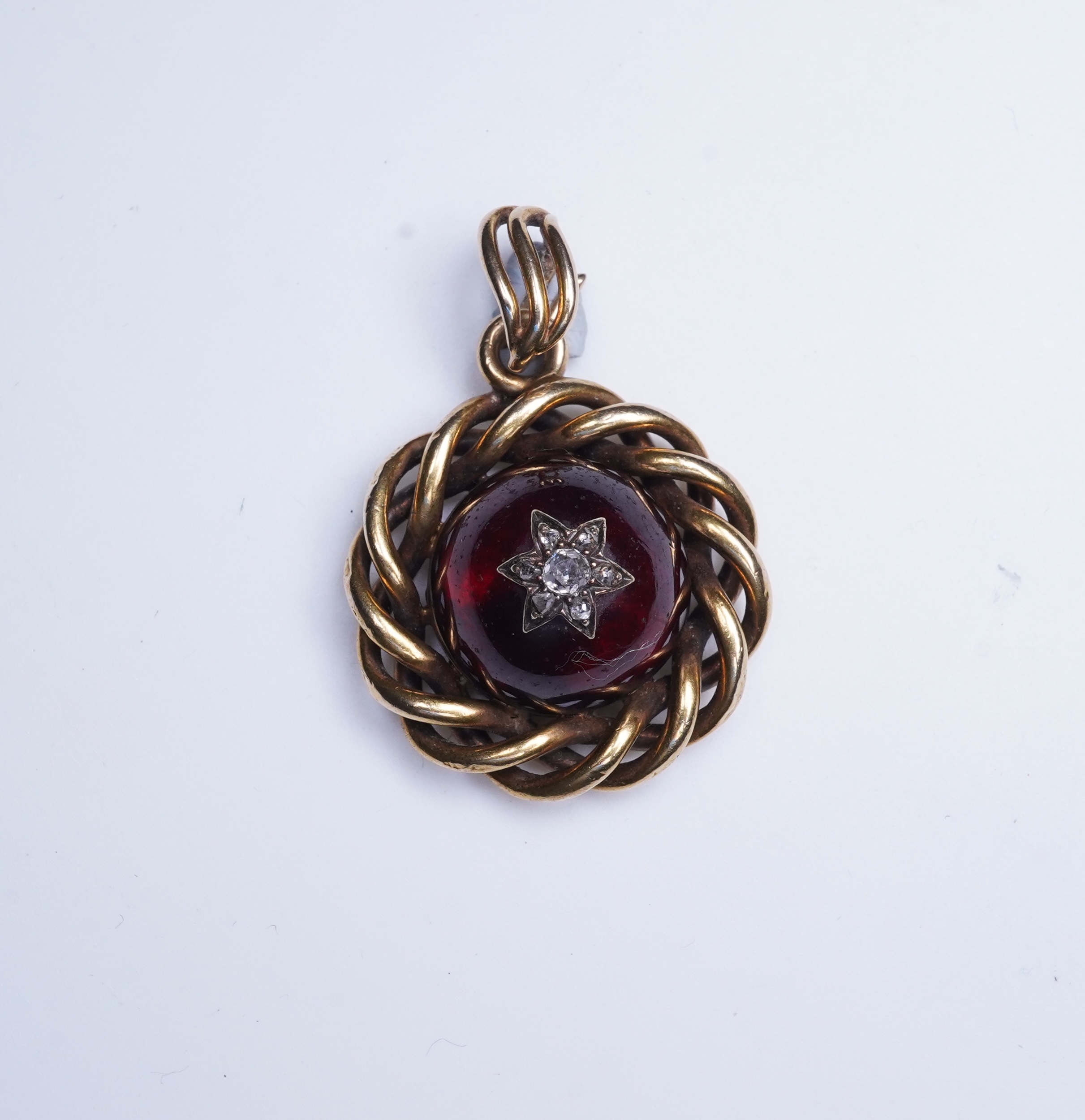 A Victorian garnet and diamond pendant, mid 19th century